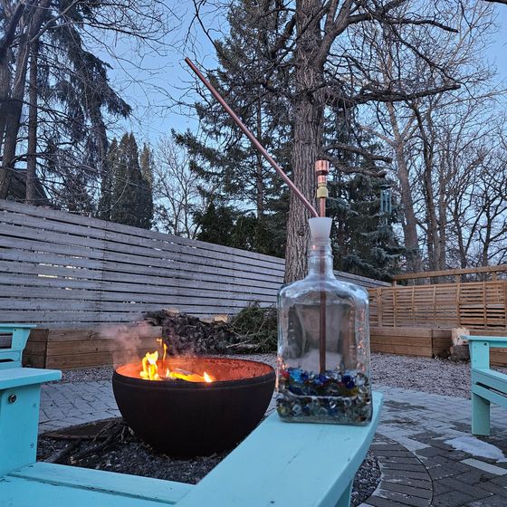 By the fire bowl at dusk, out on the back patio.